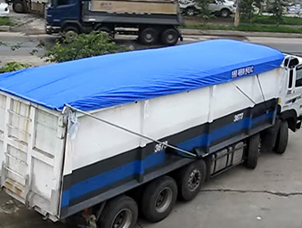 Dump truck mesh tarp